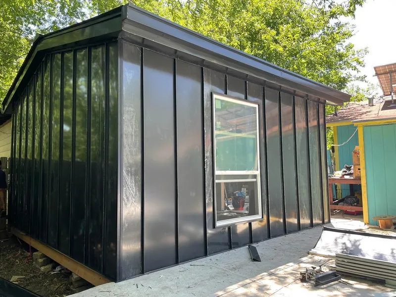 Black standing seam metal wall panels for Roof Inspection in Frankenmuth